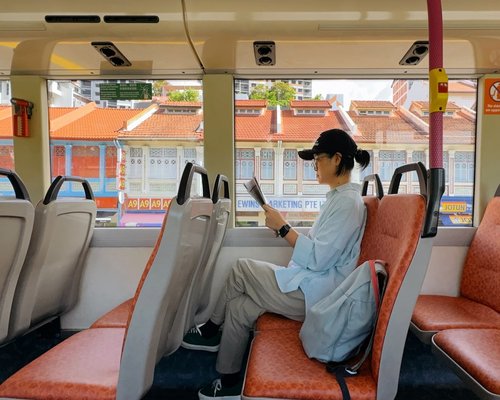 Person commuting on public transport maintaining a comfortable posture